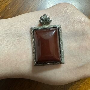 Elegant Silver and Brown Pendant